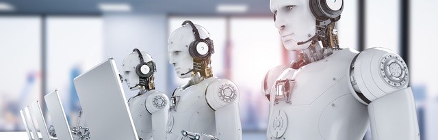 Line-of-robots-looking at-computer-monitors